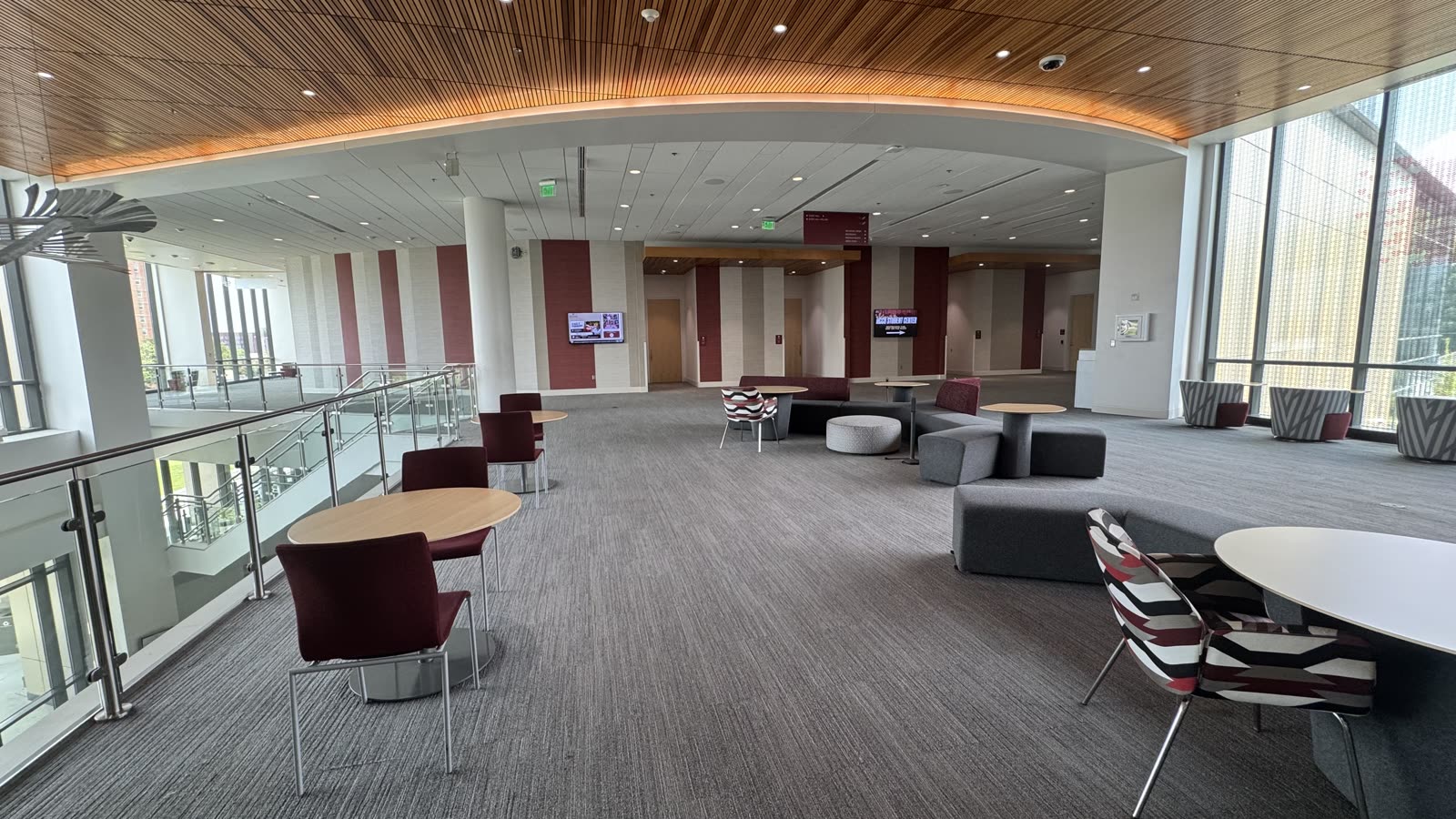 Upper-level lounge in the NCCU Student Center with lounge seating and floor-to-ceiling windows